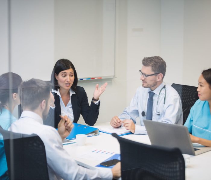 Team of doctors in a meeting at conference room Team of doctors in a meeting at conference room